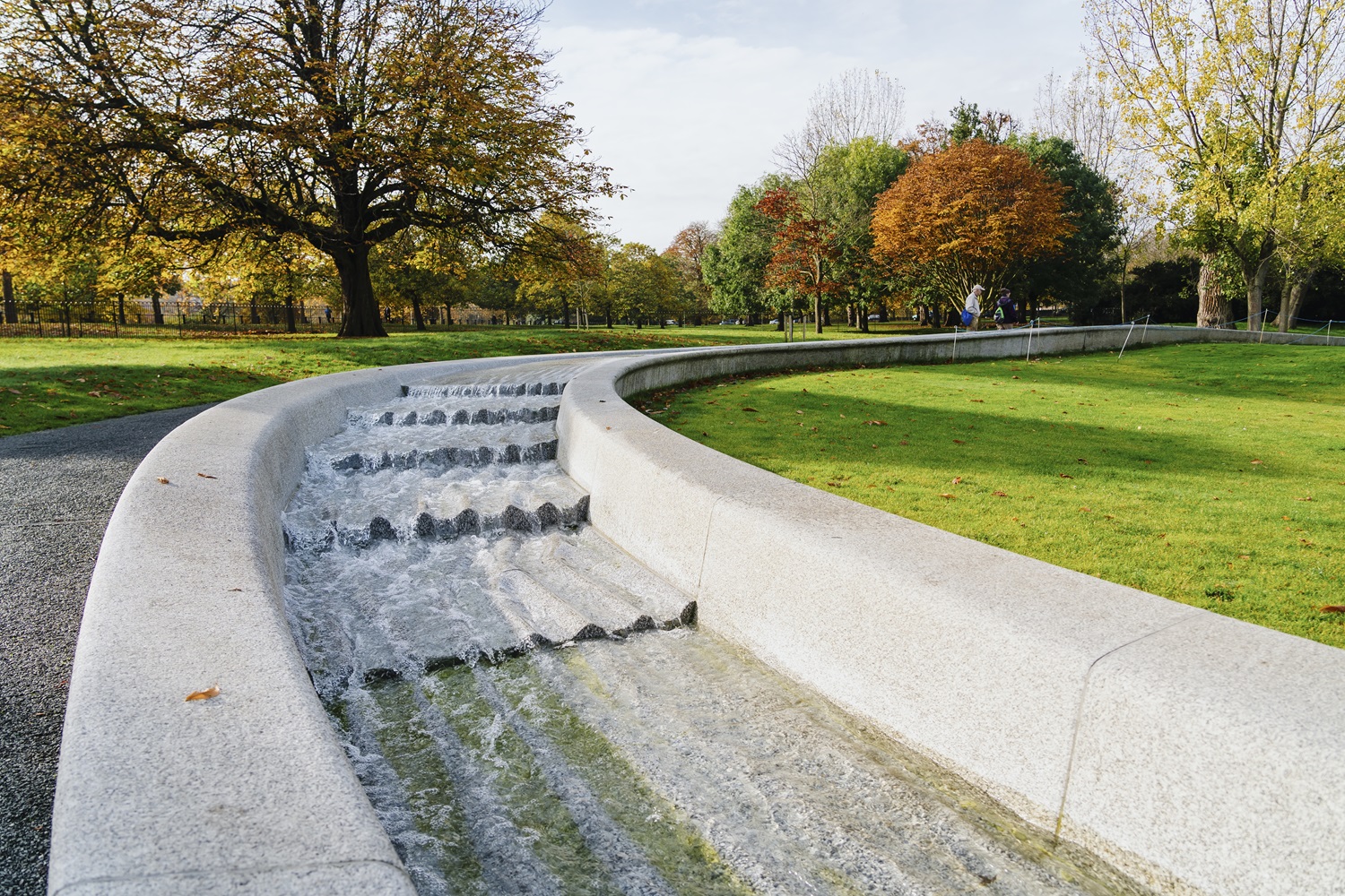 a water fountain in a park